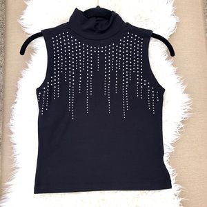 Woman’s sleeveless beaded top